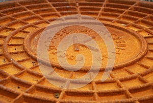 Rusty manhole cover