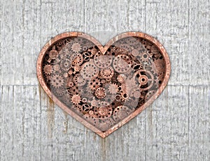 Rusty mechanism in the form of heart embedded photo
