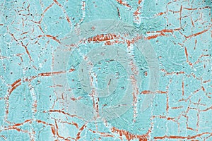 Rusty metal abstract background. Texture of an old blue grunge metal plate with cracked paint.