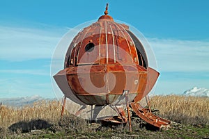 Rusty Metal Alien Spacecraft in a Field