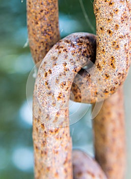 Rusty metal chain links closeup