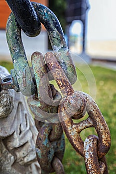 rusty metal chain a part of the anchor of the ship.