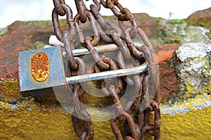 rusty metal chains and a key