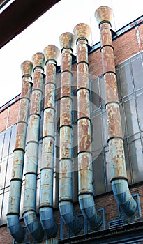 Rusty metal chimneys