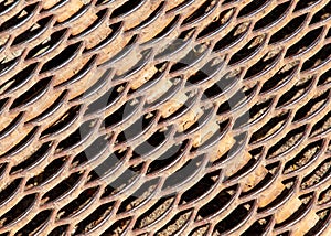 Rusty metal grate as an abstract background