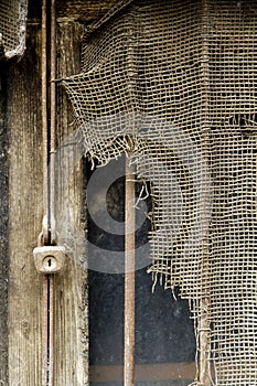 Rusty metal net and rusty padlock 13