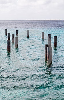 Rusty Metal Pilings in Harbor