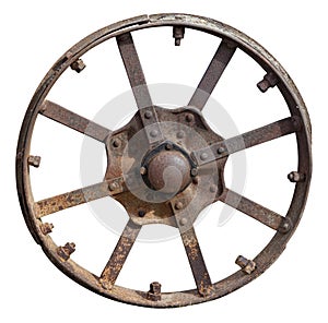 Rusty metal retro wheel from an agricultural  tractor machinery isolated
