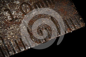 Rusty metal ruler close-up picture