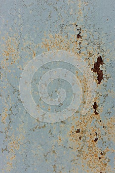 Rusty metal surface. Rough vertical background. Dirty aged pattern. Grunge cracked background. Industrial textured backdrop.