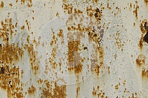 Rusty metal surface with streaks of rust.  Rusted white painted metal wall. Metal  abstract texture