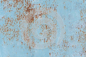 Rusty metal texture with scratches and cracks. paint traces. Blue, white and grey colors. Copy space