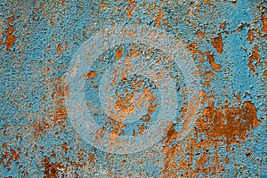 Rusty metal turquoise and red color texture background. Oxidated metal surface. Old vintage painted steel plate