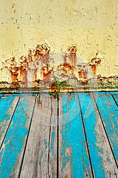 Rusty metal wall, old sheet of iron covered with rust with multi-colored paint. Large cracks. ÃÅ¾ld Rusty metal background