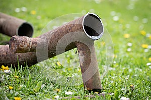 Rusty metal water pipe. Scrap metal collection and recycling