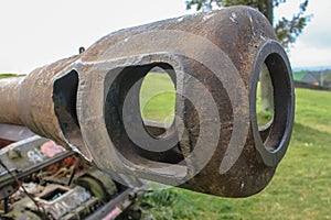 Rusty muzzle of a heavy Soviet IS-3 tank close-up