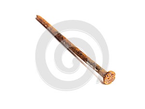 Rusty nail on white background