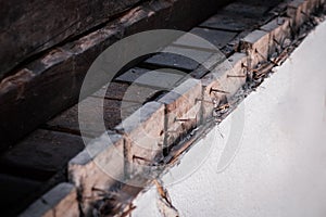 Rusty nails in old wooden wall, construction concept