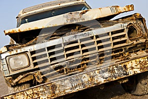 Rusty old 4x4 stuck on a beach