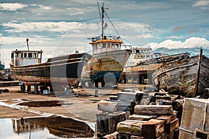 Rusty old boats on boatyard of Madalena-Pico-Azores photo