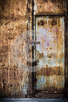 Rusty old brown metal door