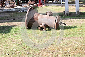 Rusty, old cover for heat exchanger, chemical equipment with tracers for connection of counter flanges at oil refinery, petrochemi