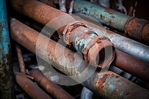 Rusty old damaged heating system pipe. Generate ai