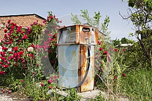 A rusty old-fashioned gas pump