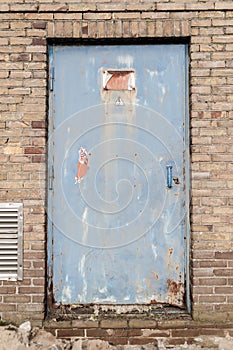 Rusty old high voltage warning sign