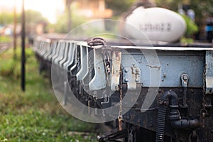 Rusty old iron freight train In the train station, Thai train stops at the station