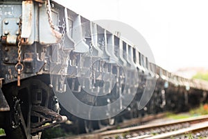 Rusty old iron freight train In the train station, Thai train stops at the station.soft focus