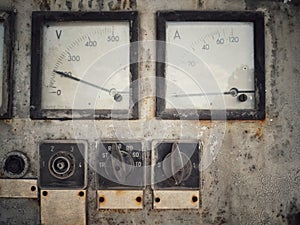 Rusty old large voltmeter and amperemeter