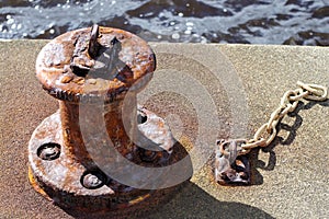 Rusty Old Mooring Bollard photo