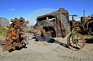 Rusty old one wheeled tractor