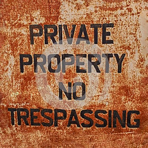 Rusty Old Private Property No Trespassing Sign