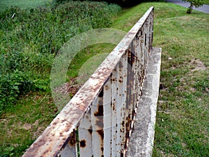 Rusty old railing at lawn