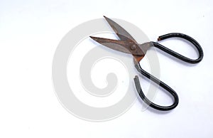 Rusty old scissors isolate on white background