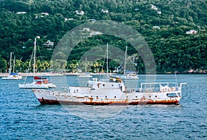 Rusty old ship at Port Elizabeth in Bequia island in Saint Vincent and the Grenadines
