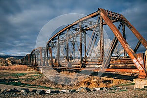 Rusty old train bridge across the Colorado River