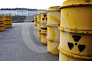 Rusty and old tuns with radioactive waste