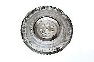 The rusty old used engine flywheel