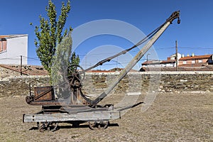 Rusty old winch crane used in a stone quarry