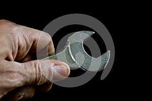 Rusty, old workshop keys. Hydraulic keys on a black table in a w