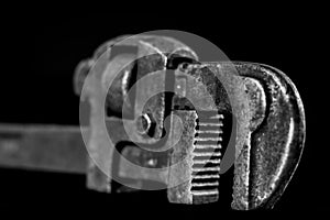 Rusty, old workshop keys. Hydraulic keys on a black table in a w