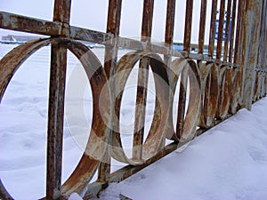 Rusty ornamental iron circles in the city, ancien architecture, detail of door photo