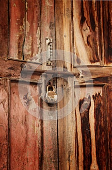 Rusty padlock on door
