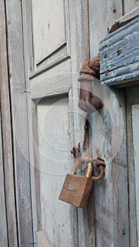 Rusty Padlock and Doorknob