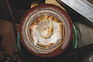 Rusty paint jar. old bucket with acrylic paint
