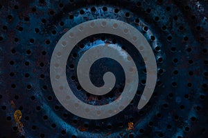 Rusty perforated metal background