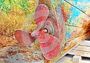 Rusty propeller of an old boat